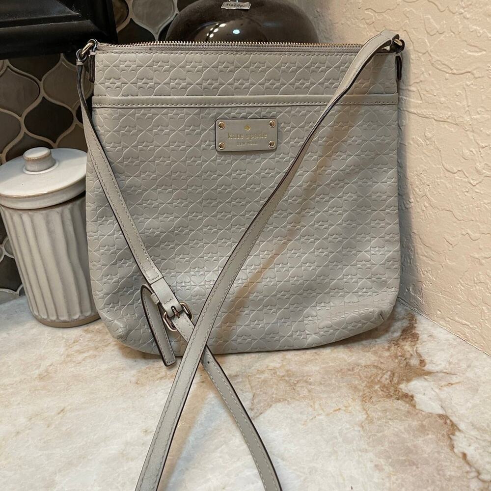 Kate Spade light gray leather Spade embossed Crossbody purse